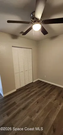 a bathroom with a toilet a sink and shower