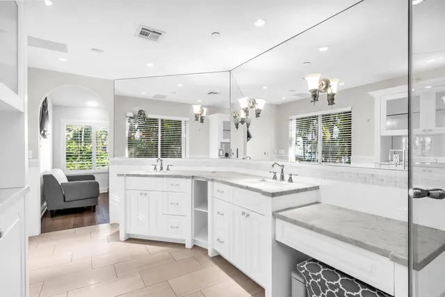 a view of a garden with a wooden fence