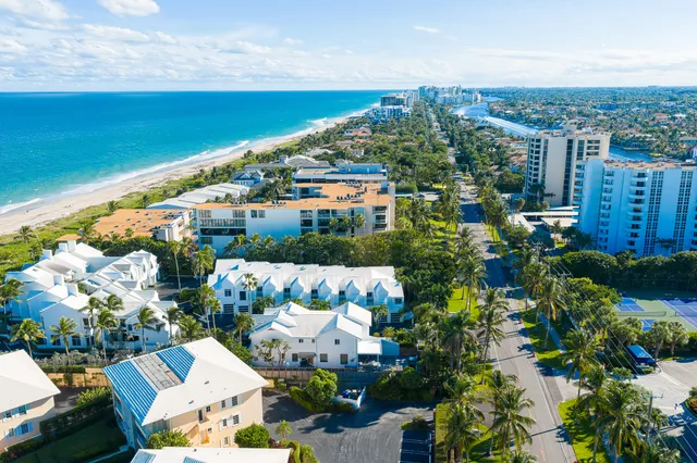a view of a lake with a city