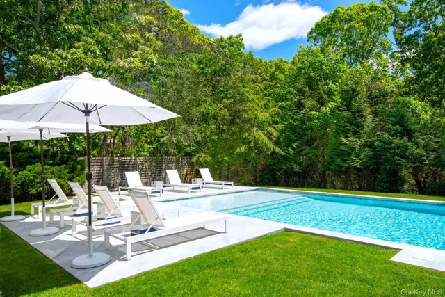 a view of a house with backyard porch and patio