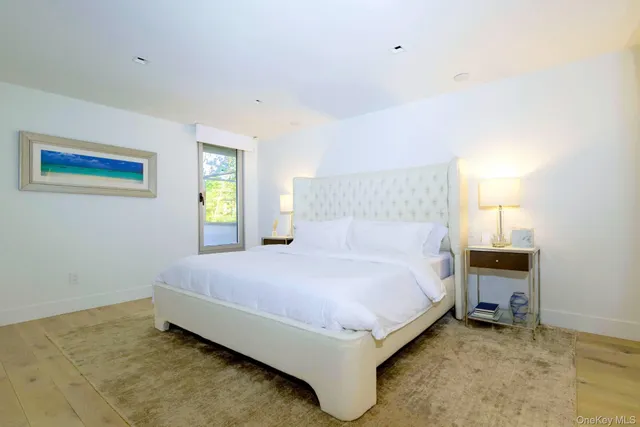 a large bed sitting in a room