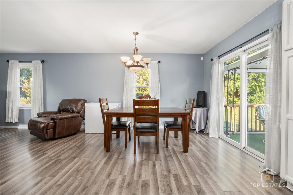 48W201 Keslinger Road Maple Park, IL 60151 - Photo 14 of 48 a dining room with furniture window wooden floor