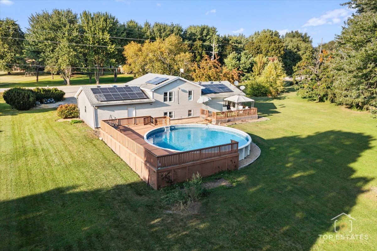 48W201 Keslinger Road Maple Park, IL 60151 - Photo 42 of 48 a aerial view of a house with swimming pool and big yard