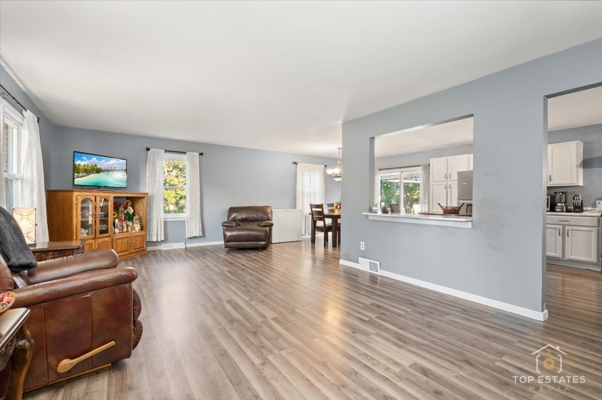 48W201 Keslinger Road Maple Park, IL 60151 - Photo 9 of 48 a living room with furniture and a wooden floor