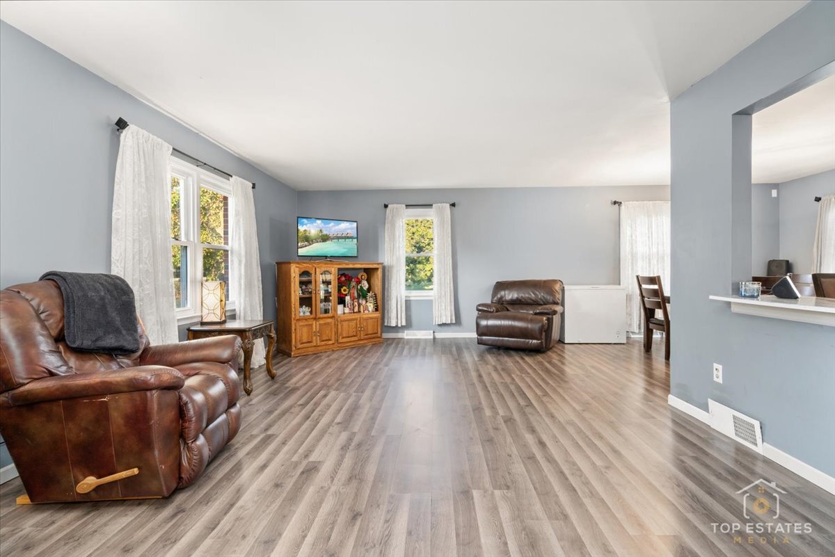 48W201 Keslinger Road Maple Park, IL 60151 - Photo 10 of 48 a living room with furniture and a large window