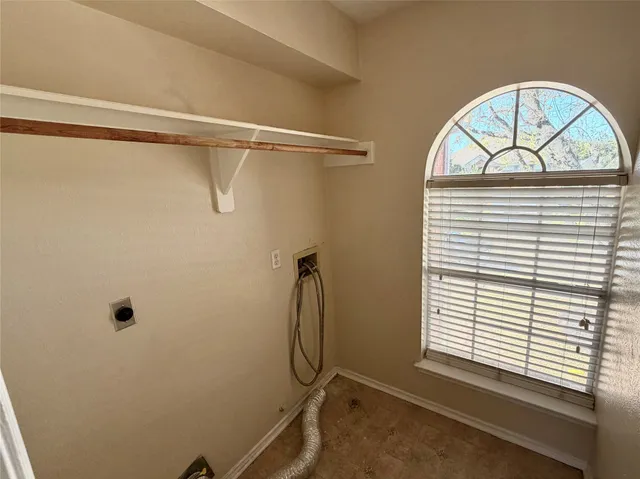 a bathroom with a double vanity sink and mirror