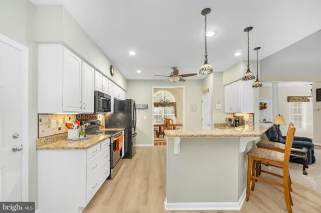 a bedroom with a bed and a cabinets