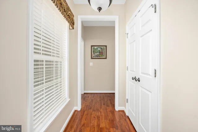 a en suite bathroom with a tub sink and mirror