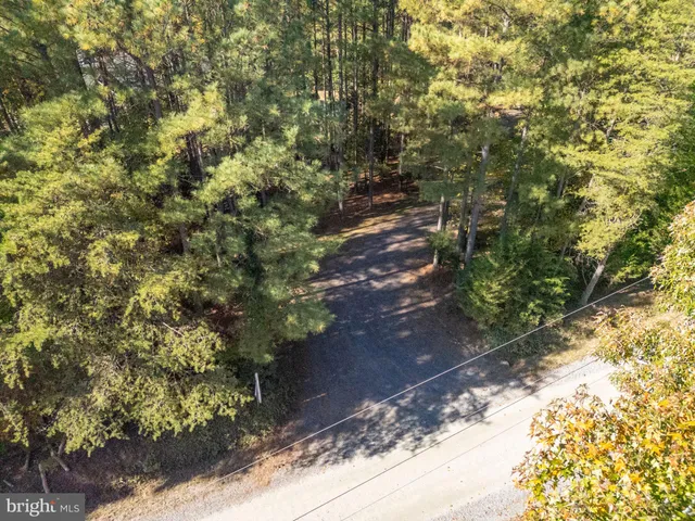 an aerial view of a house having yard