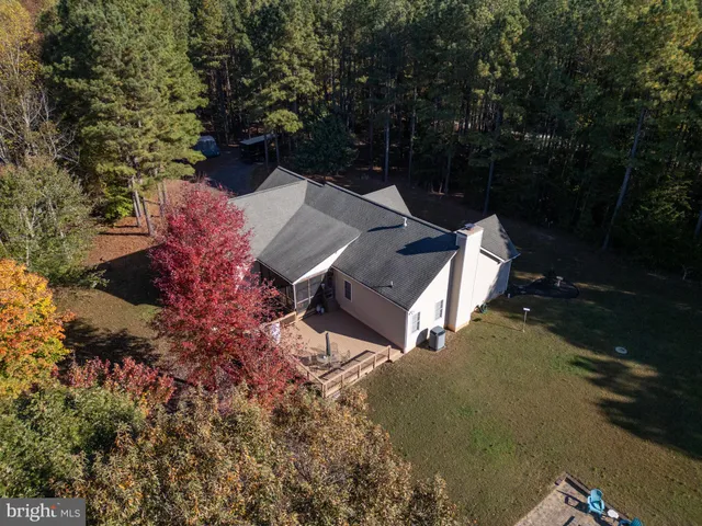 a view of a two chairs in the balcony