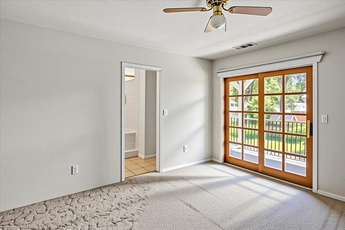 893 Wetherbee Avenue Manteca, CA 95337 - Photo 15 of 39 a view of an empty room with a window