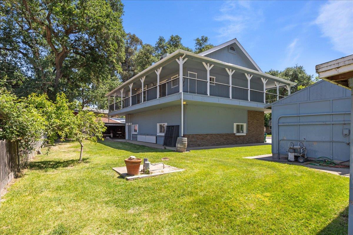 893 Wetherbee Avenue Manteca, CA 95337 - Photo 22 of 39 a front view of a house with swimming pool