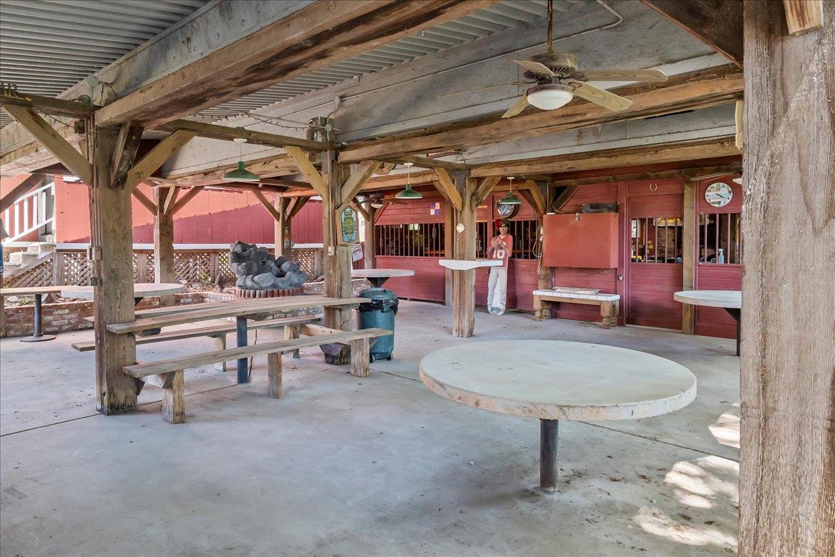 893 Wetherbee Avenue Manteca, CA 95337 - Photo 31 of 39 a view of a chairs and tables in patio