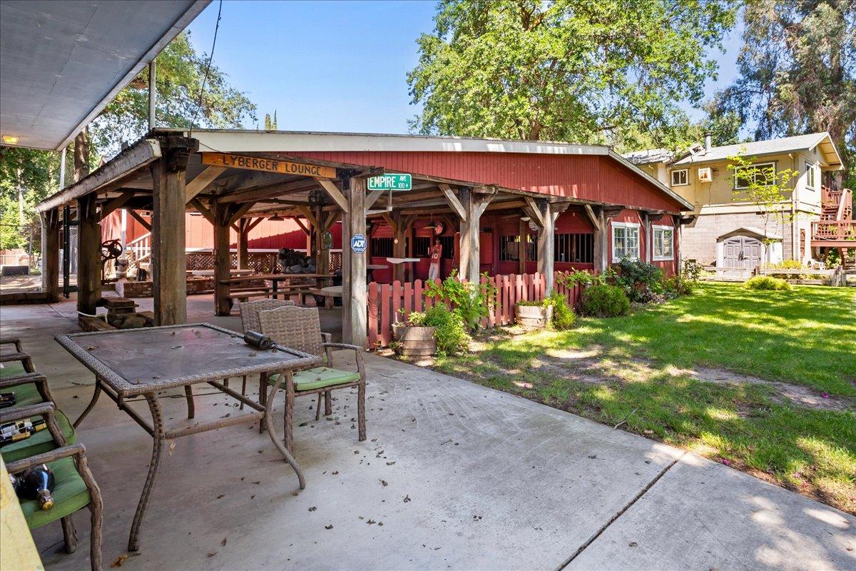 893 Wetherbee Avenue Manteca, CA 95337 - Photo 38 of 39 a view of a chairs and tables in the patio