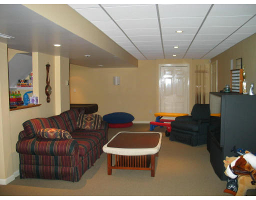 600 Boston Road Groton, MA 01450 - Photo 12 of 13 a living room with furniture and a glass door
