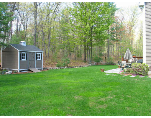 600 Boston Road Groton, MA 01450 - Photo 13 of 13 a front view of a house with garden