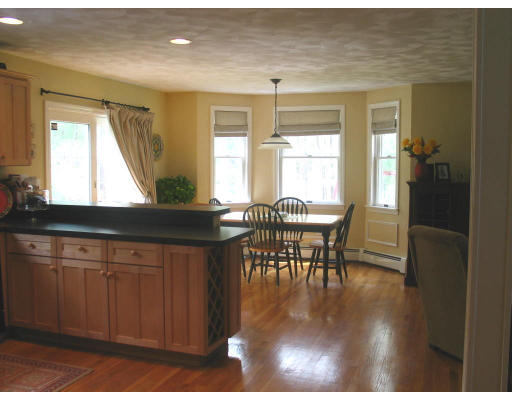 600 Boston Road Groton, MA 01450 - Photo 4 of 13 a view of a dining room with furniture window and wooden floor