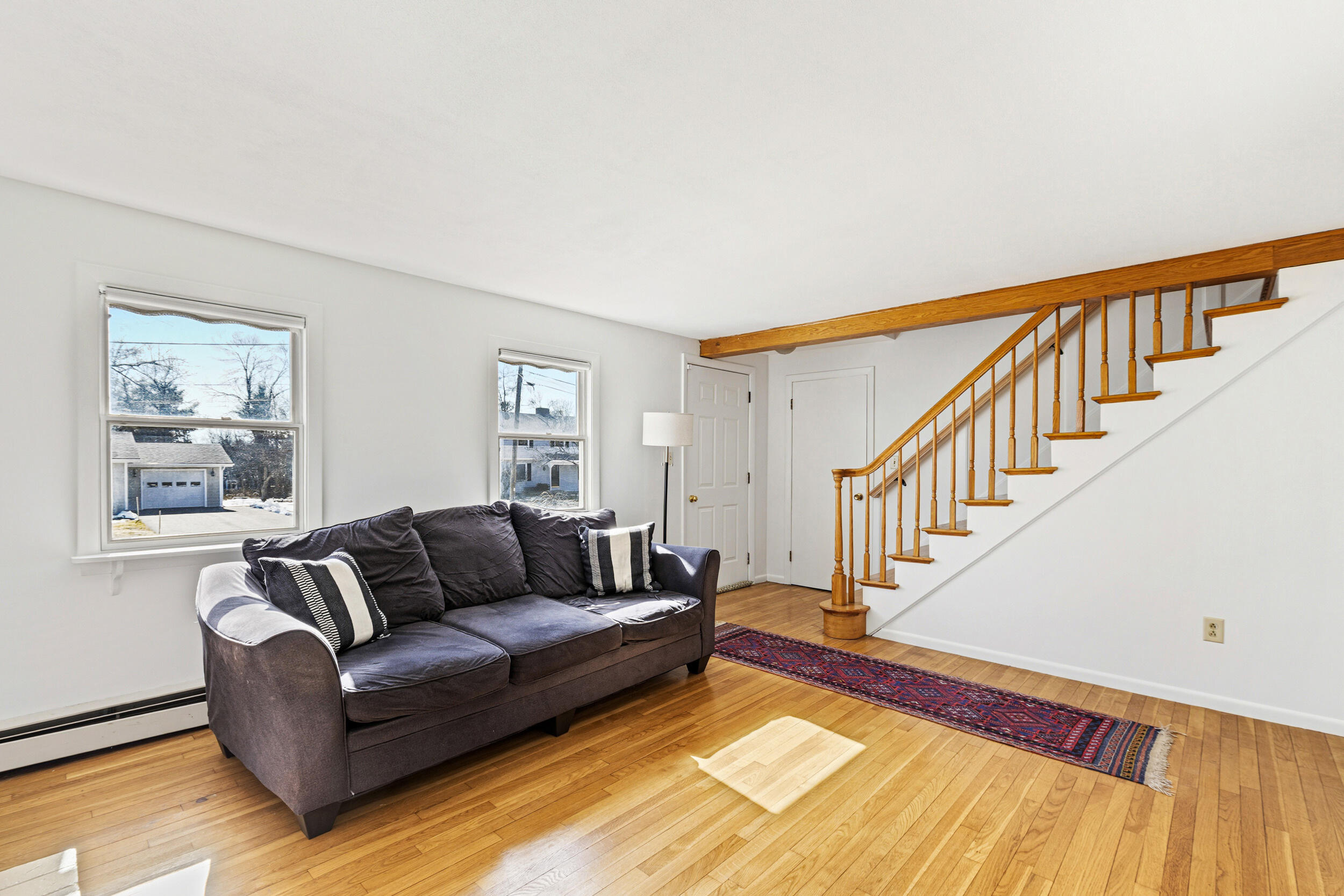 3 Willow Lane Cumberland, ME 04021 - Photo 22 of 58 Living room with stairway leading