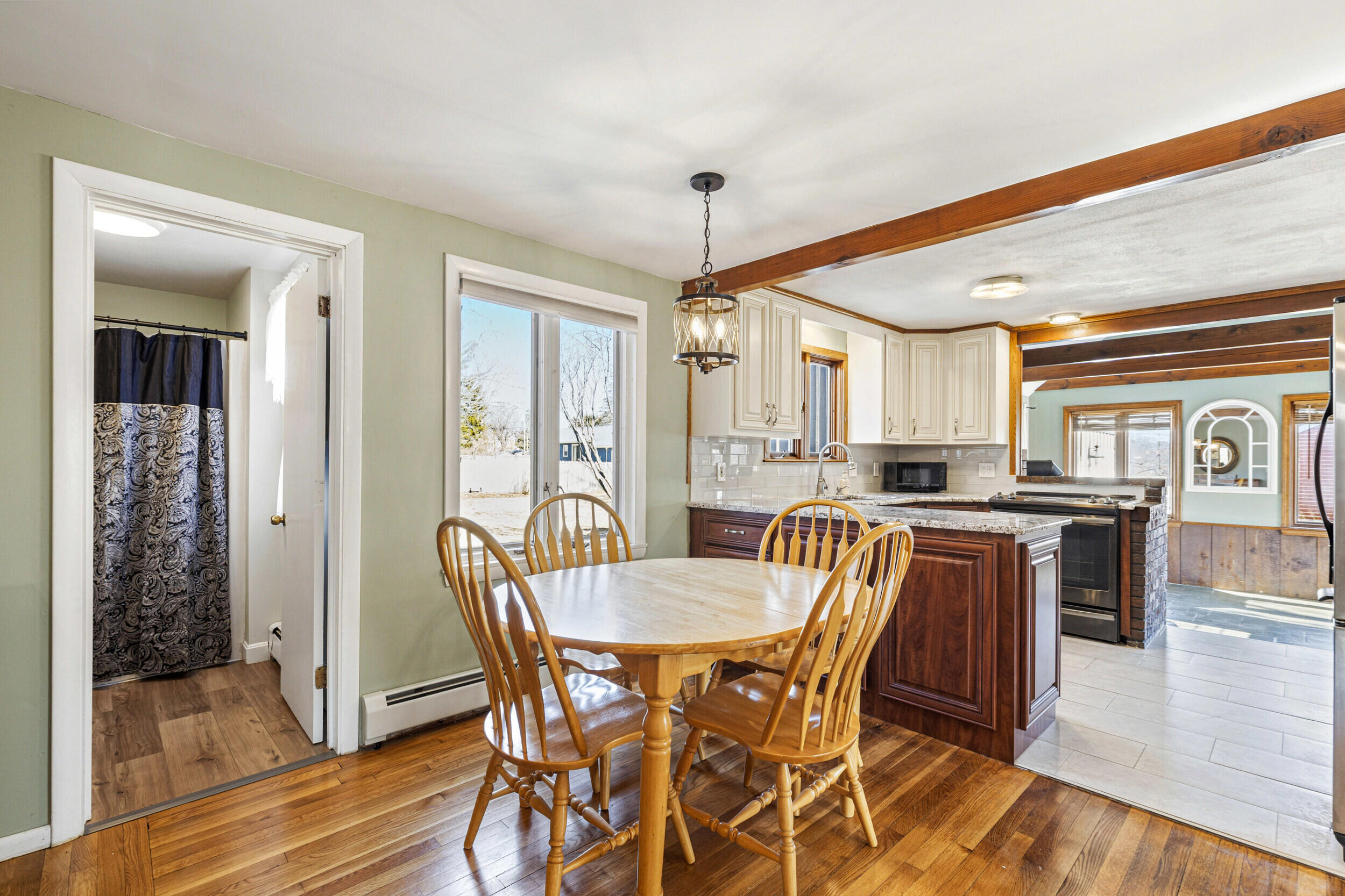 3 Willow Lane Cumberland, ME 04021 - Photo 9 of 58 Kitchen opens to dining room.