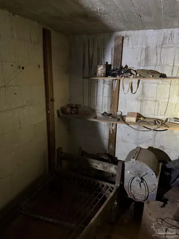 a bedroom with a bed and a shower