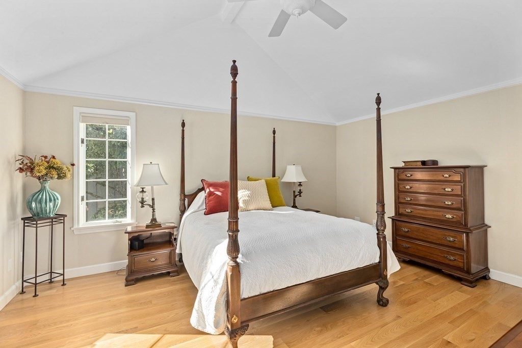 50 Floret Circle, Unit 50 Hingham, MA 02043 - Photo 11 of 28 a bed room with a bed window and a table