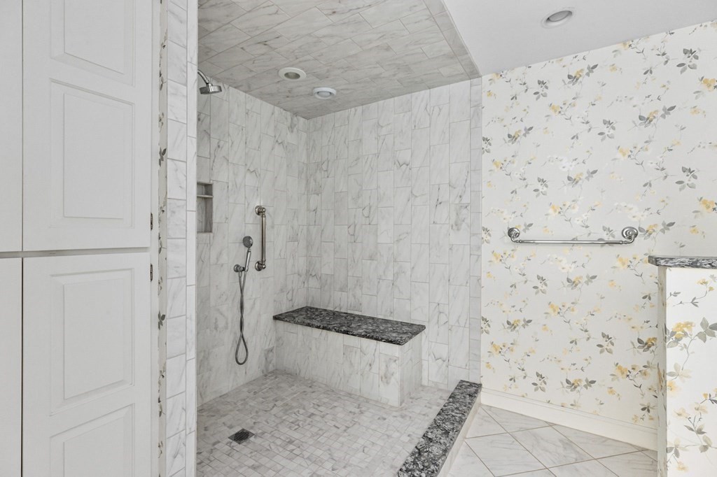50 Floret Circle, Unit 50 Hingham, MA 02043 - Photo 12 of 28 a bathroom with a shower and a toilet