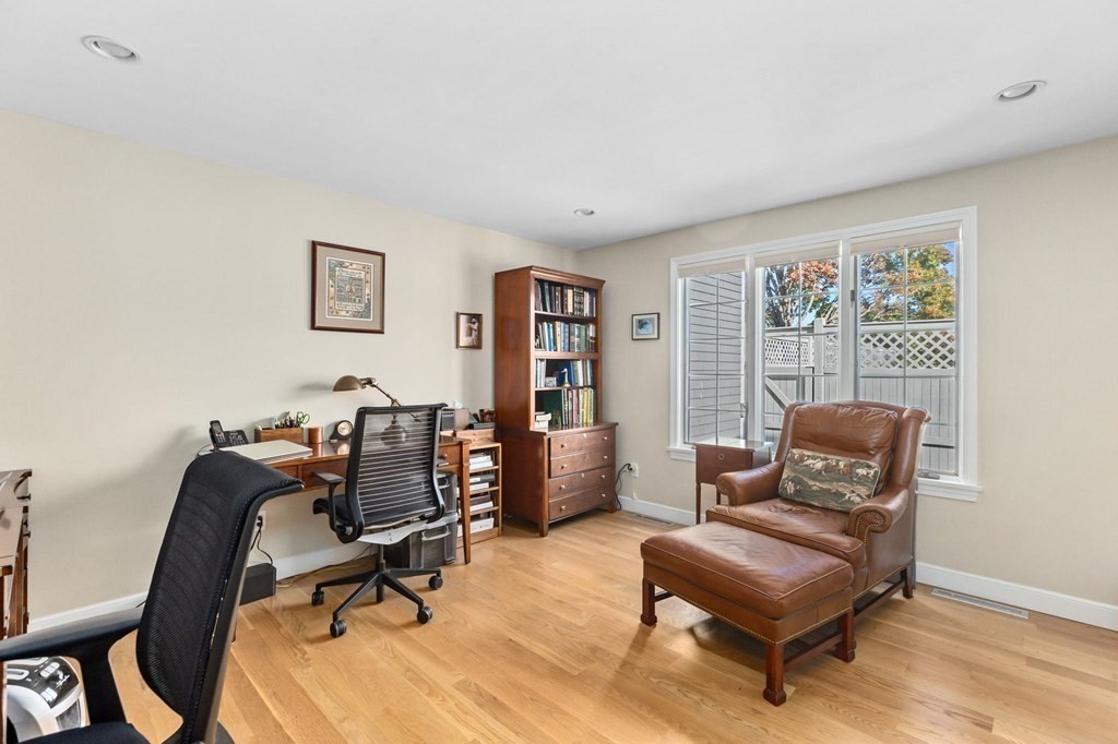 50 Floret Circle, Unit 50 Hingham, MA 02043 - Photo 14 of 28 a view of a workspace with furniture and a window