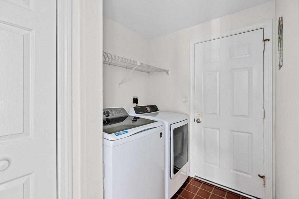 50 Floret Circle, Unit 50 Hingham, MA 02043 - Photo 16 of 28 a view of storage and utility room with washer and dryer