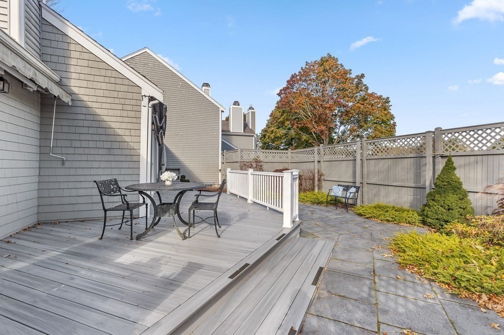 50 Floret Circle, Unit 50 Hingham, MA 02043 - Photo 19 of 28 a view of a outdoor seating area with furniture