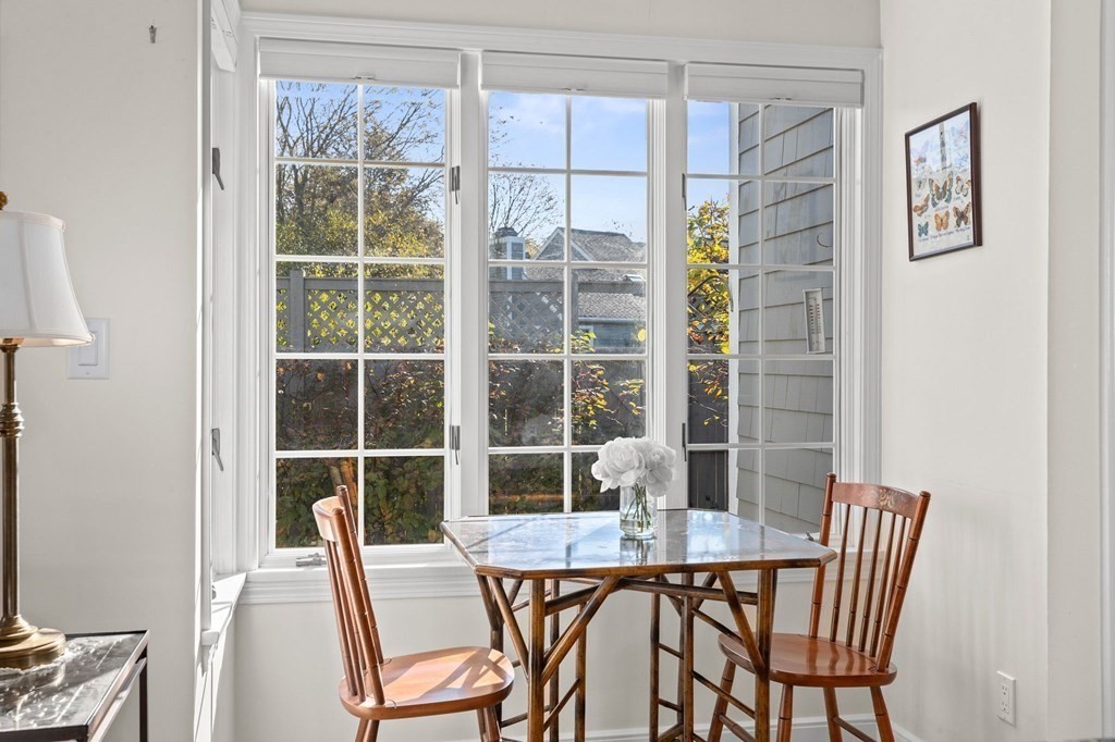 50 Floret Circle, Unit 50 Hingham, MA 02043 - Photo 4 of 28 a dining room with furniture and window