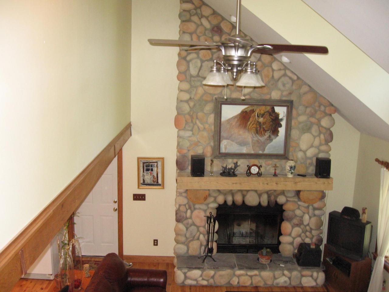 11 Elk Road Sandisfield, MA 01255 - Photo 14 of 14 a living room with furniture and a fireplace