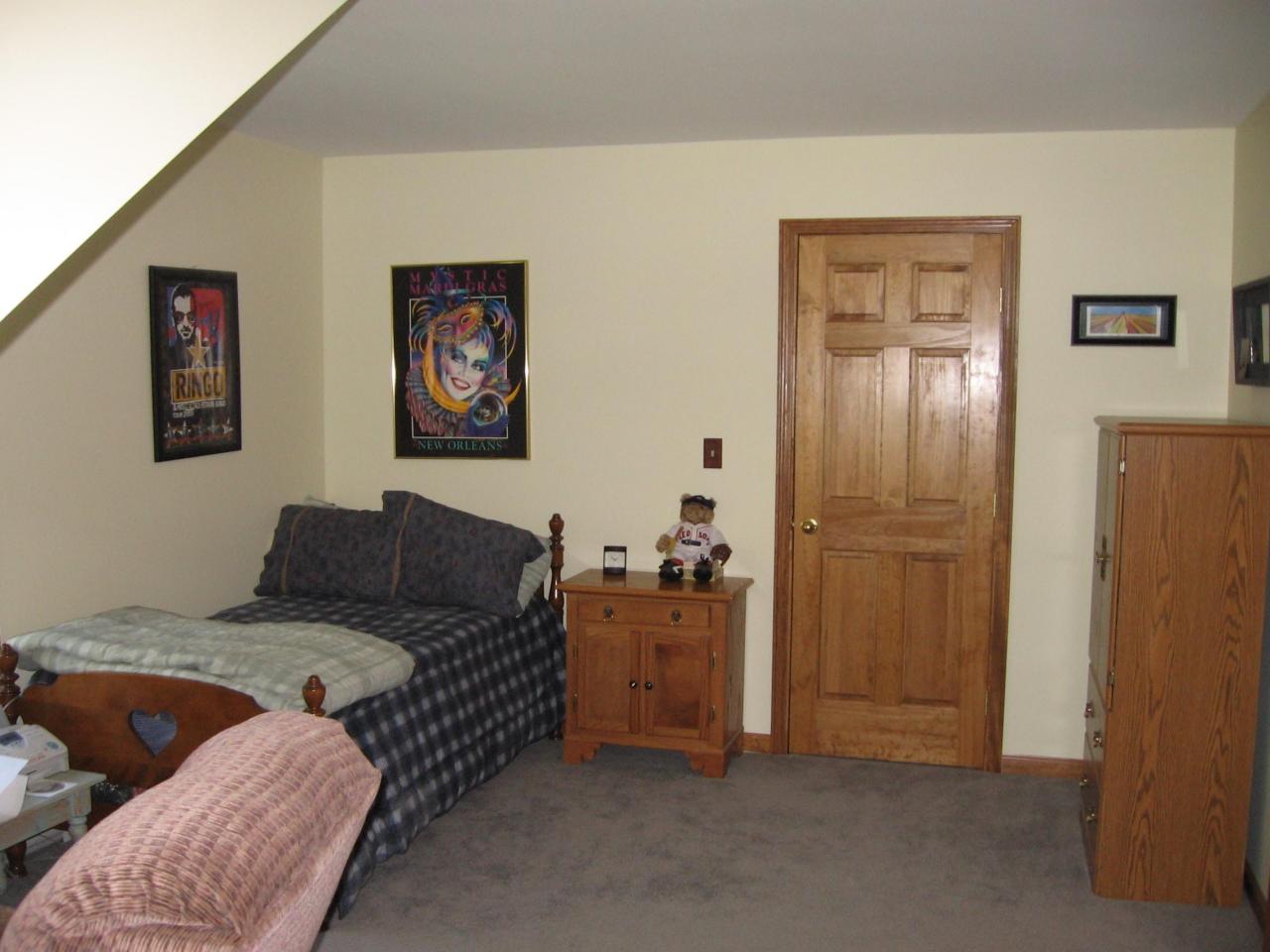 11 Elk Road Sandisfield, MA 01255 - Photo 6 of 14 a bedroom with a bed and a couch