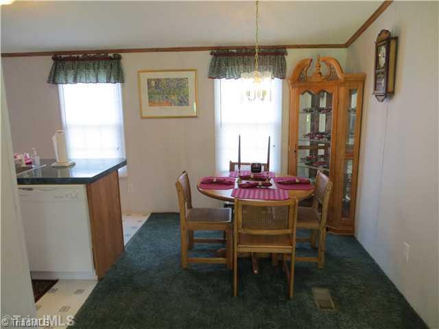 343 Will Boone Road Mocksville, NC 27028 - Photo 5 of 16 Dining Room. This area could accommodate an even larger table. Don t forget that the furniture is available for sale independent of the home purchase contract.