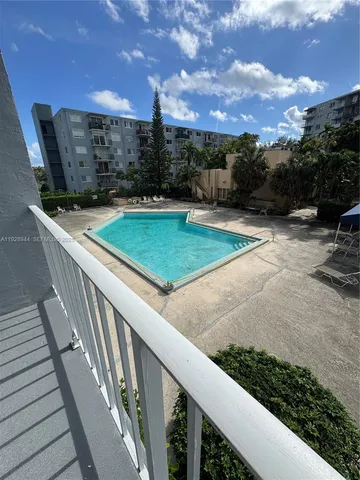 a view of a swimming pool and outdoor space