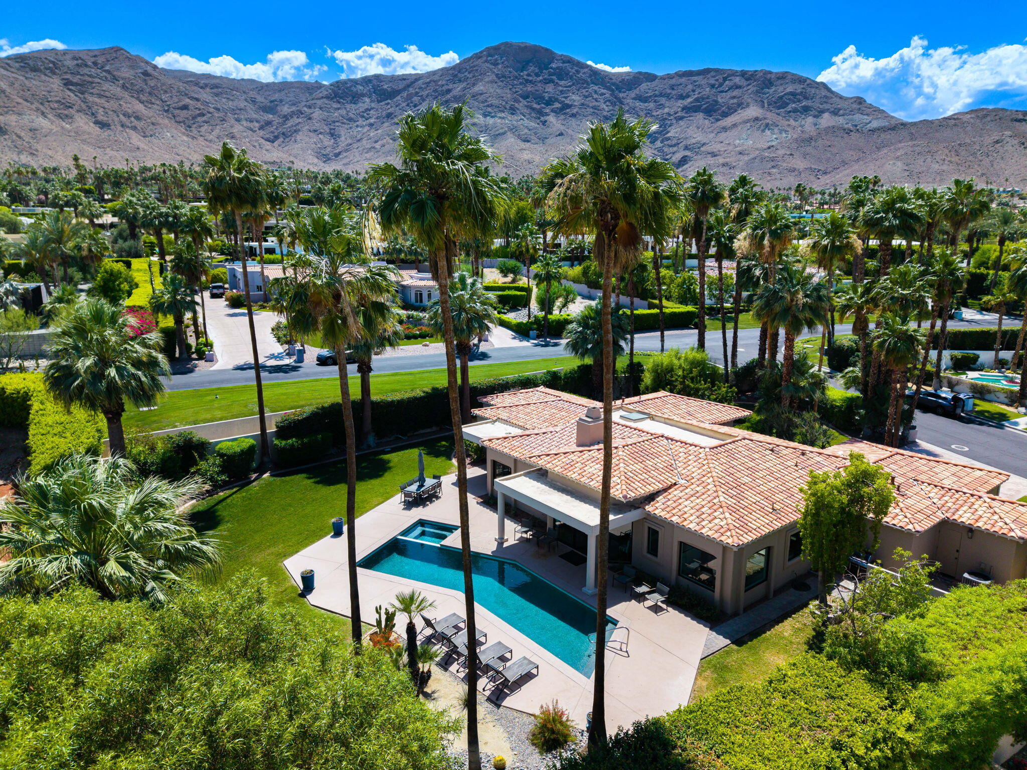 5 Terrace Place Rancho Mirage, CA 92270 - Photo 1 of 53 an aerial view of a house with a garden