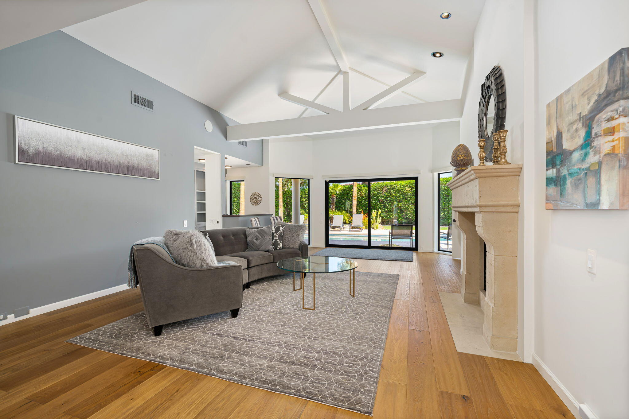 5 Terrace Place Rancho Mirage, CA 92270 - Photo 16 of 53 a living room with furniture and a fireplace
