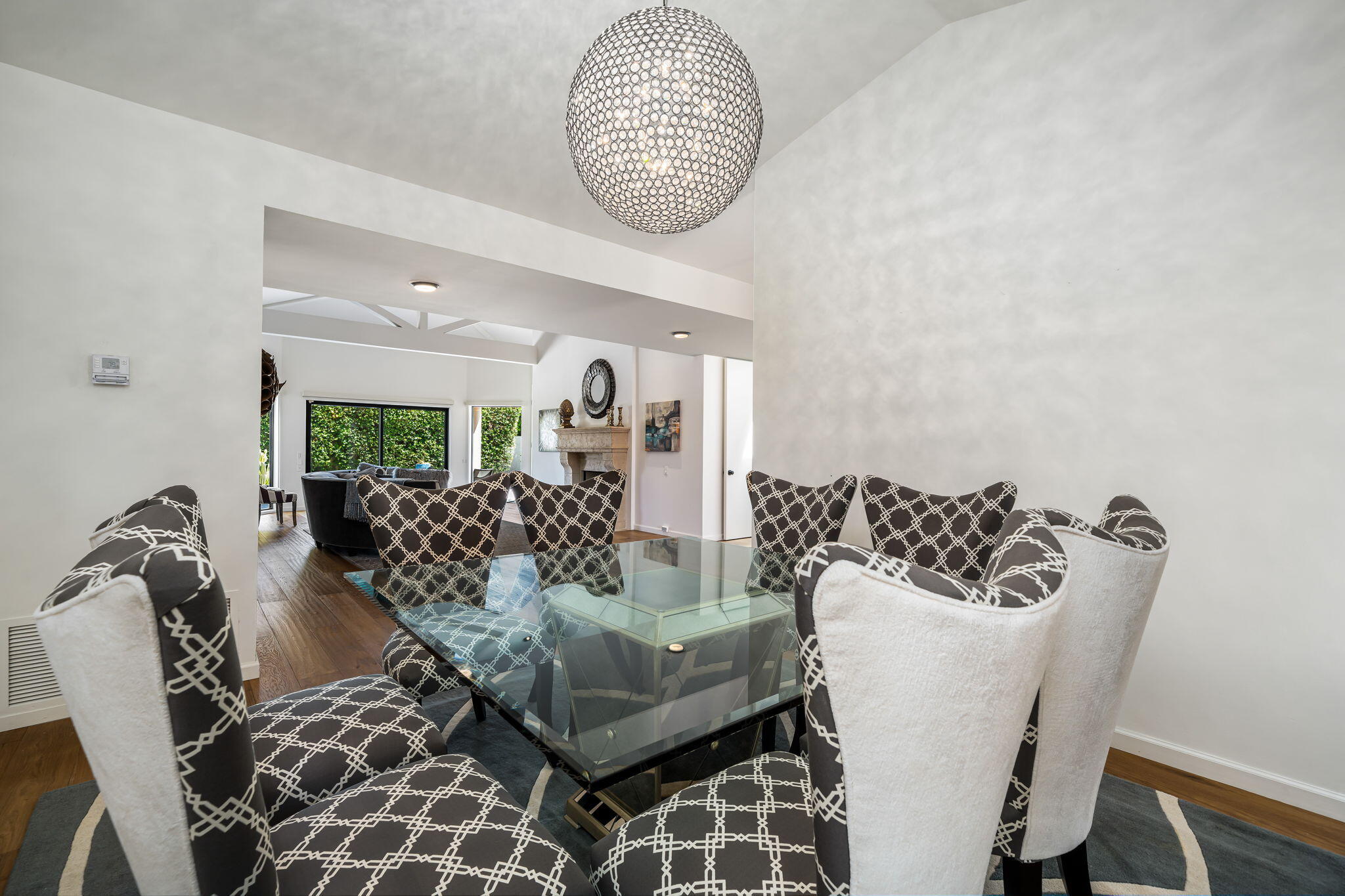 5 Terrace Place Rancho Mirage, CA 92270 - Photo 24 of 53 a living room with furniture a couch and a potted plant