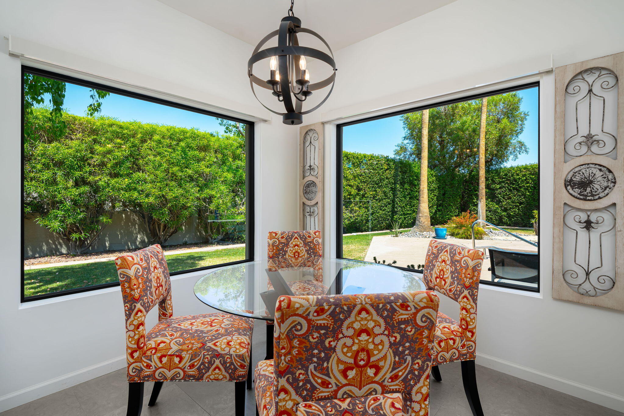 5 Terrace Place Rancho Mirage, CA 92270 - Photo 29 of 53 a living room with furniture and a large window