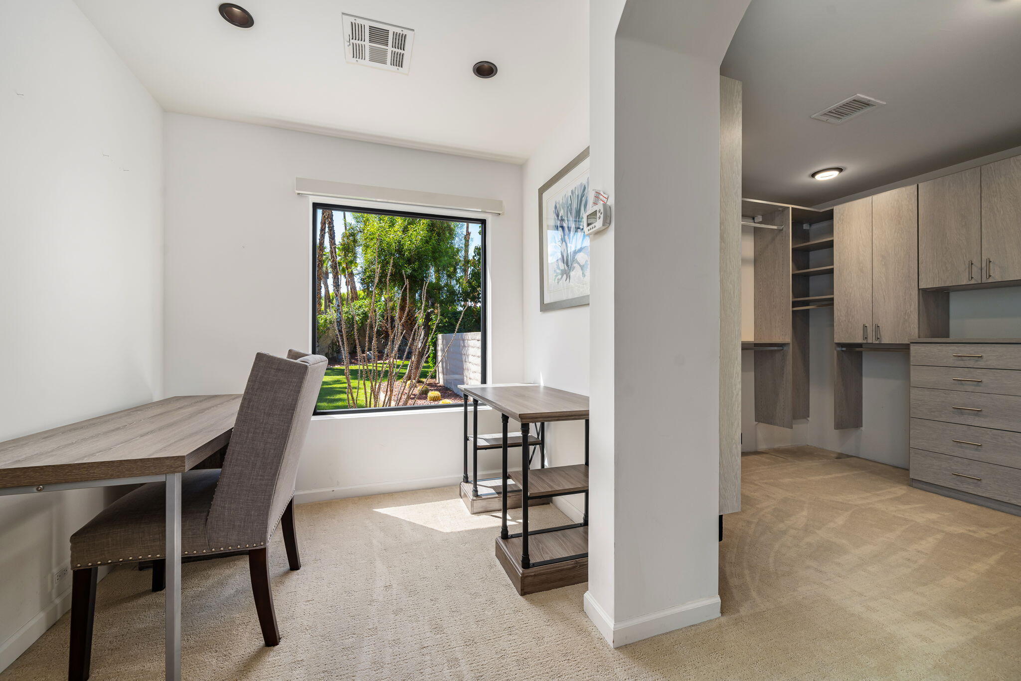 5 Terrace Place Rancho Mirage, CA 92270 - Photo 33 of 53 a dining room with furniture and a floor to ceiling window