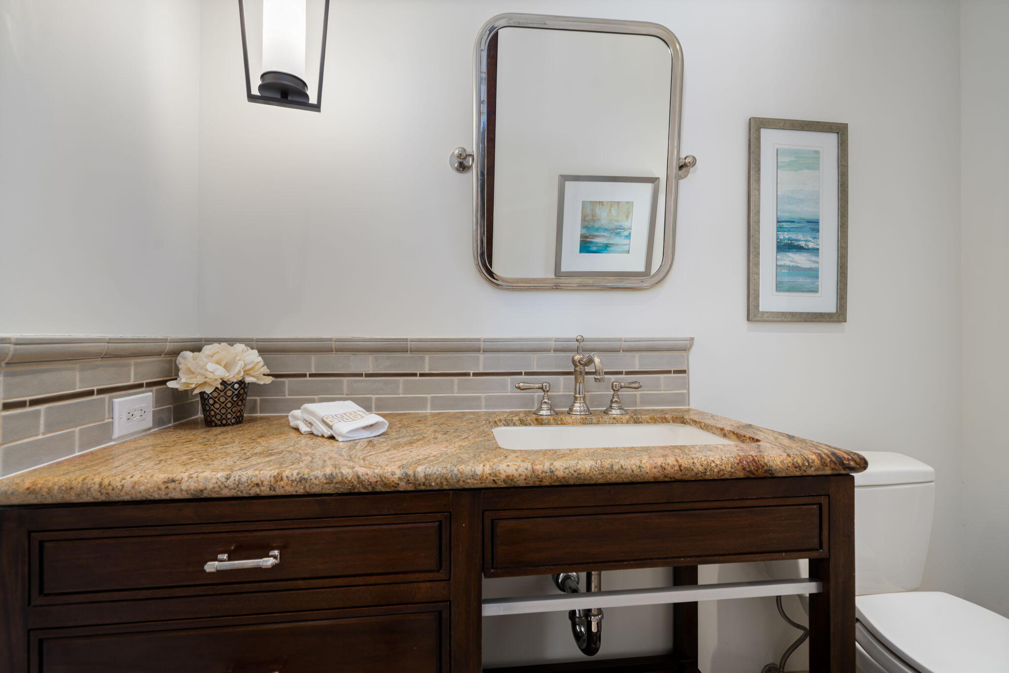 5 Terrace Place Rancho Mirage, CA 92270 - Photo 38 of 53 a bathroom with a sink and a mirror