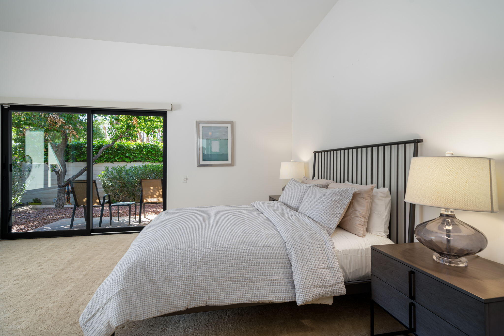 5 Terrace Place Rancho Mirage, CA 92270 - Photo 39 of 53 a bedroom with a bed and large window