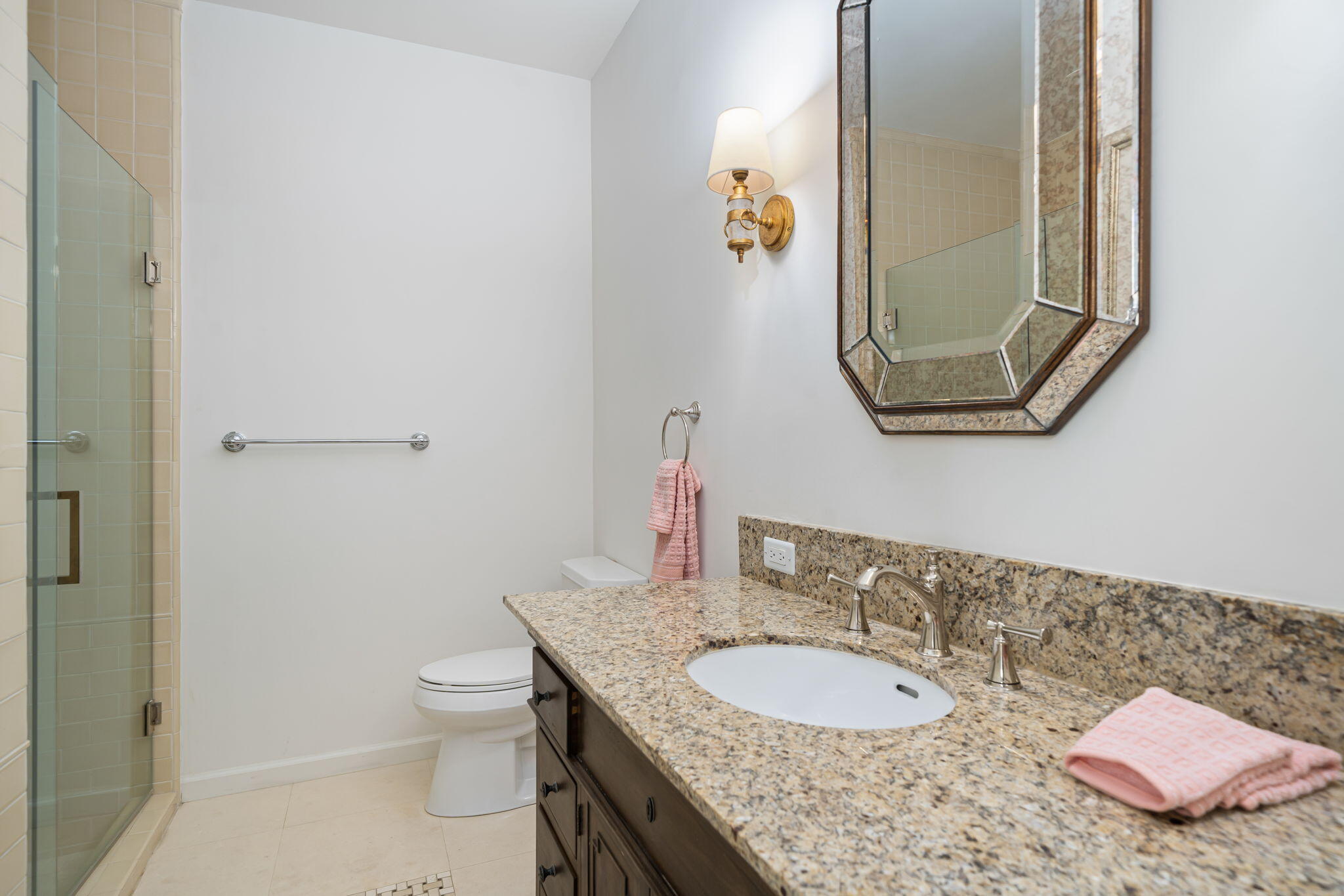 5 Terrace Place Rancho Mirage, CA 92270 - Photo 41 of 53 a bathroom with a granite countertop sink a toilet and a mirror