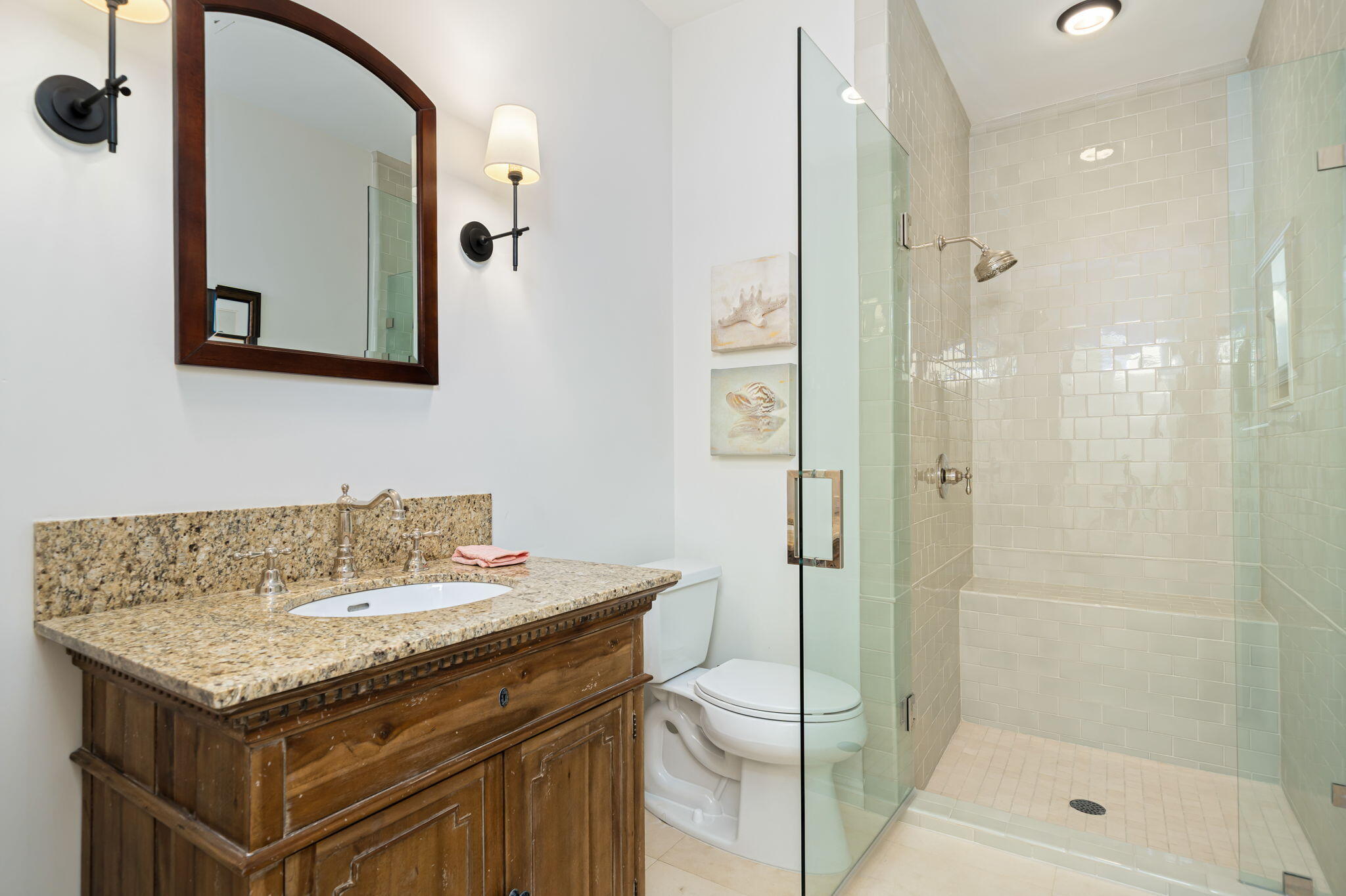 5 Terrace Place Rancho Mirage, CA 92270 - Photo 43 of 53 a bathroom with a granite countertop sink a mirror and a shower