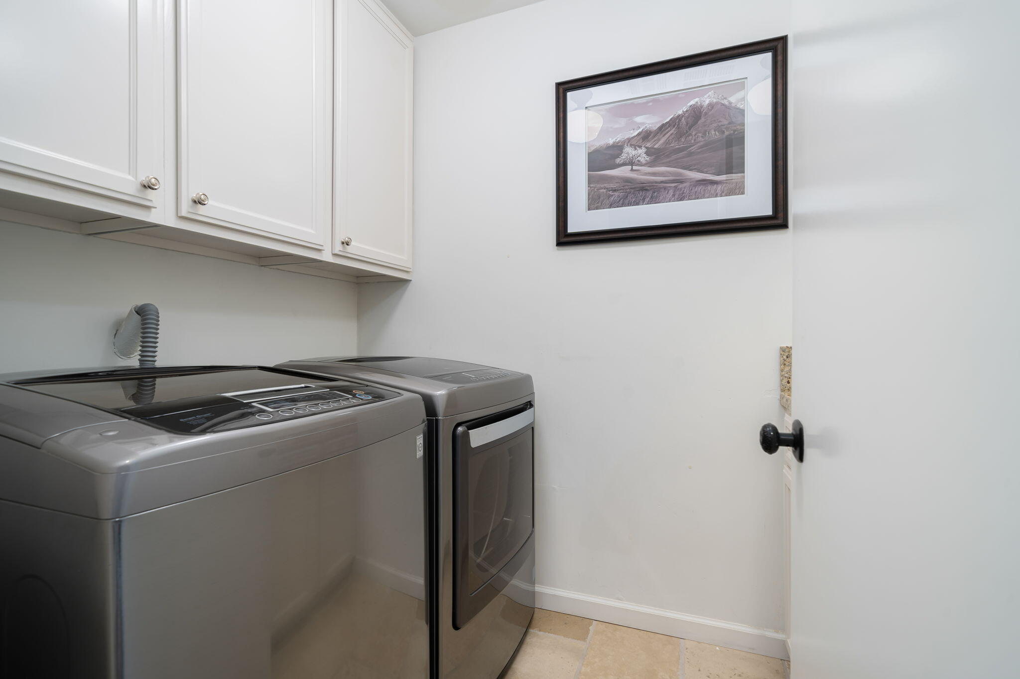 5 Terrace Place Rancho Mirage, CA 92270 - Photo 44 of 53 a utility room with dryer and washer