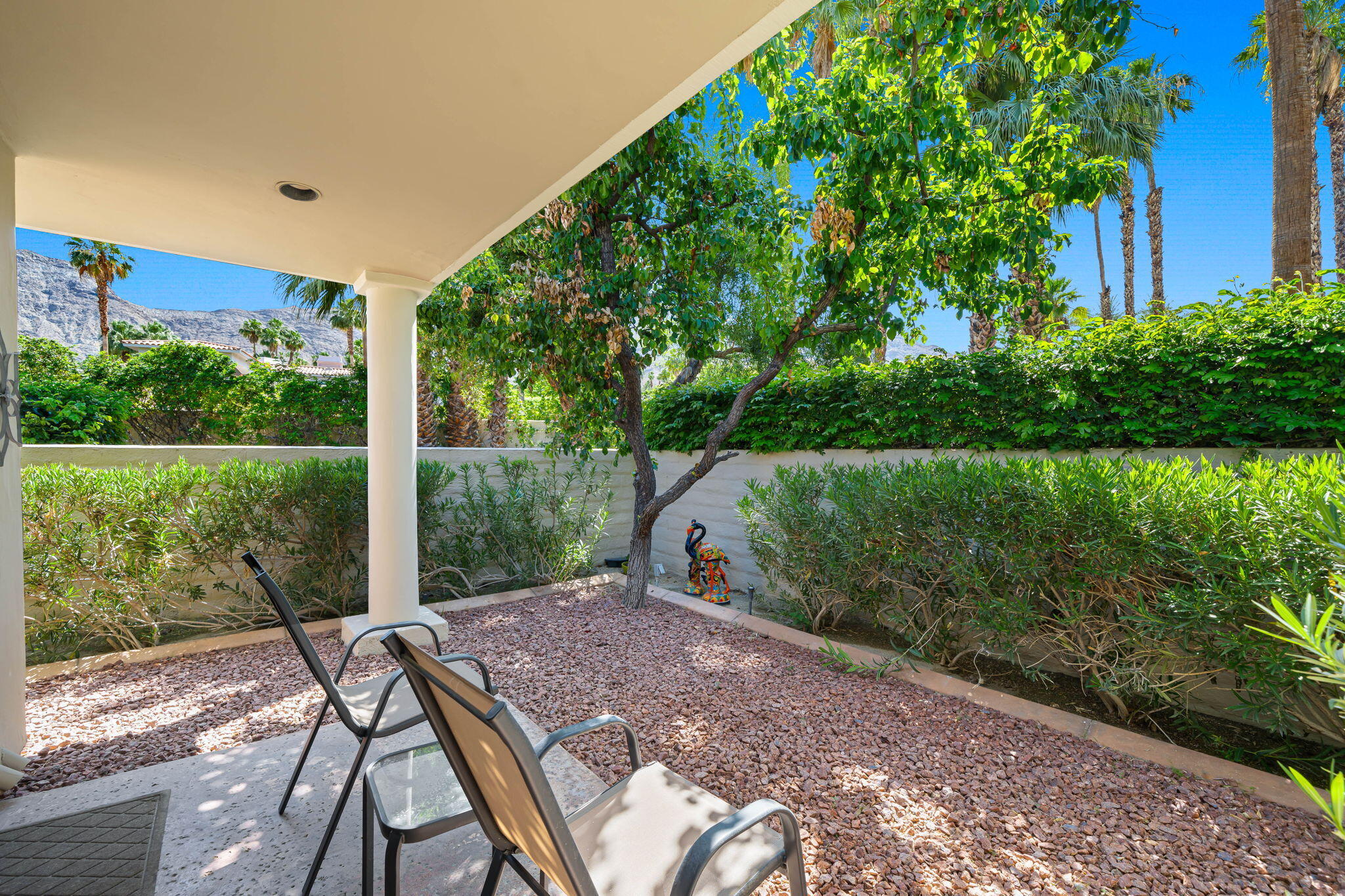 5 Terrace Place Rancho Mirage, CA 92270 - Photo 46 of 53 a view of a chairs and table in patio