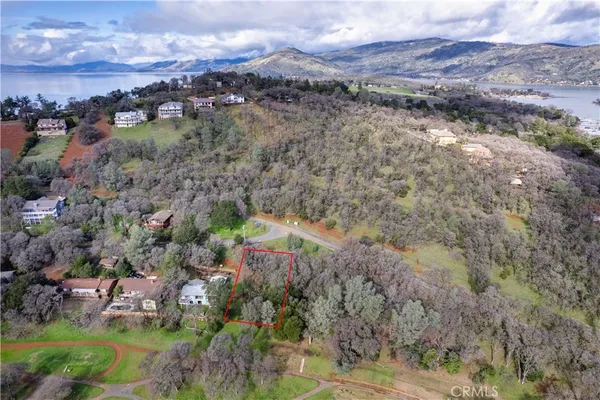a view of a city with mountains in the background