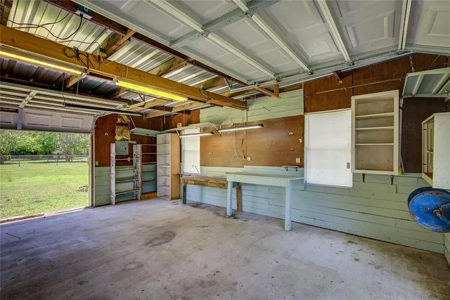 a view of room with wooden floor