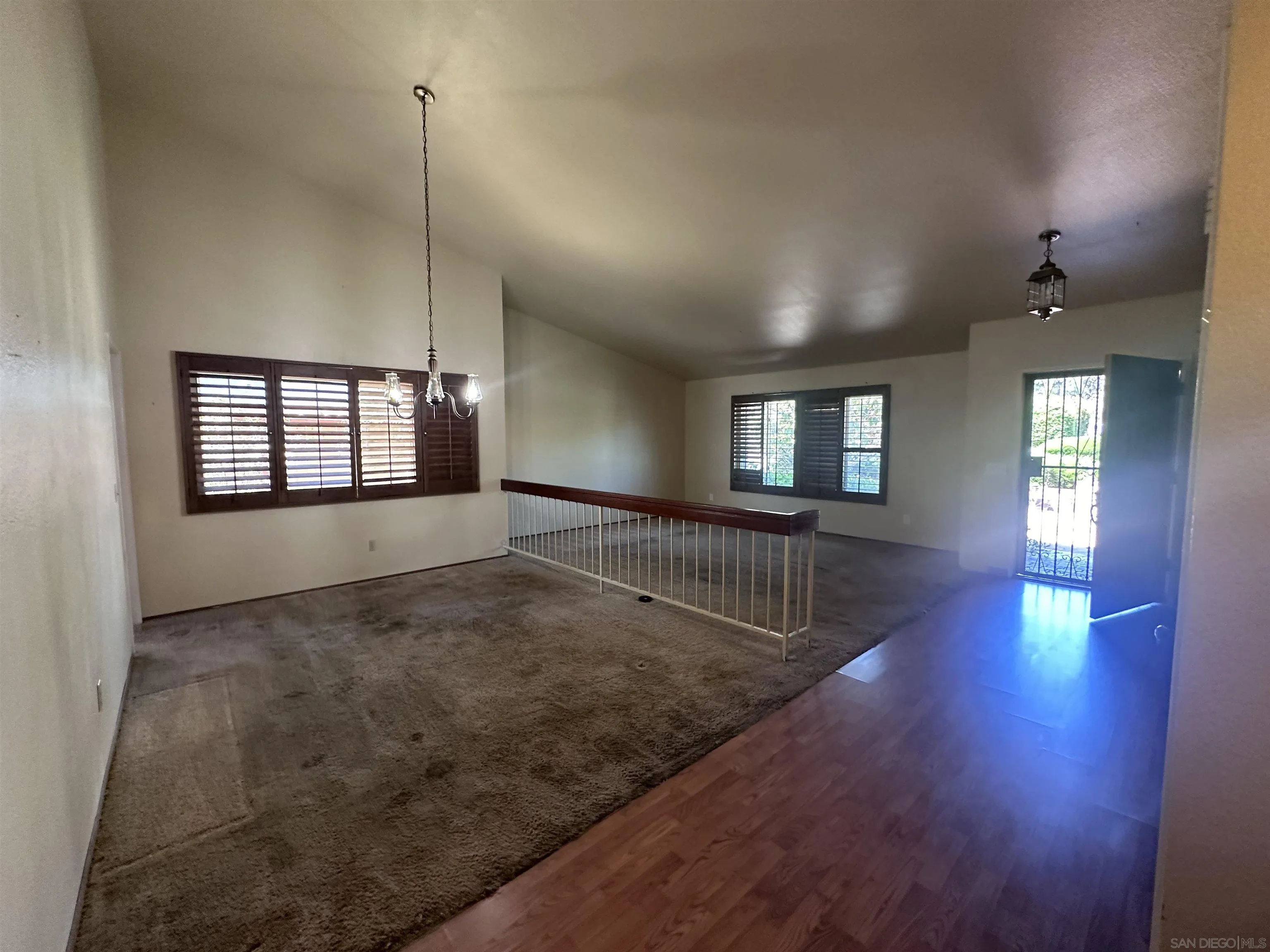 14625 Silverset Street Poway, CA 92064 - Photo 2 of 7 a view of empty room with wooden floor and fan