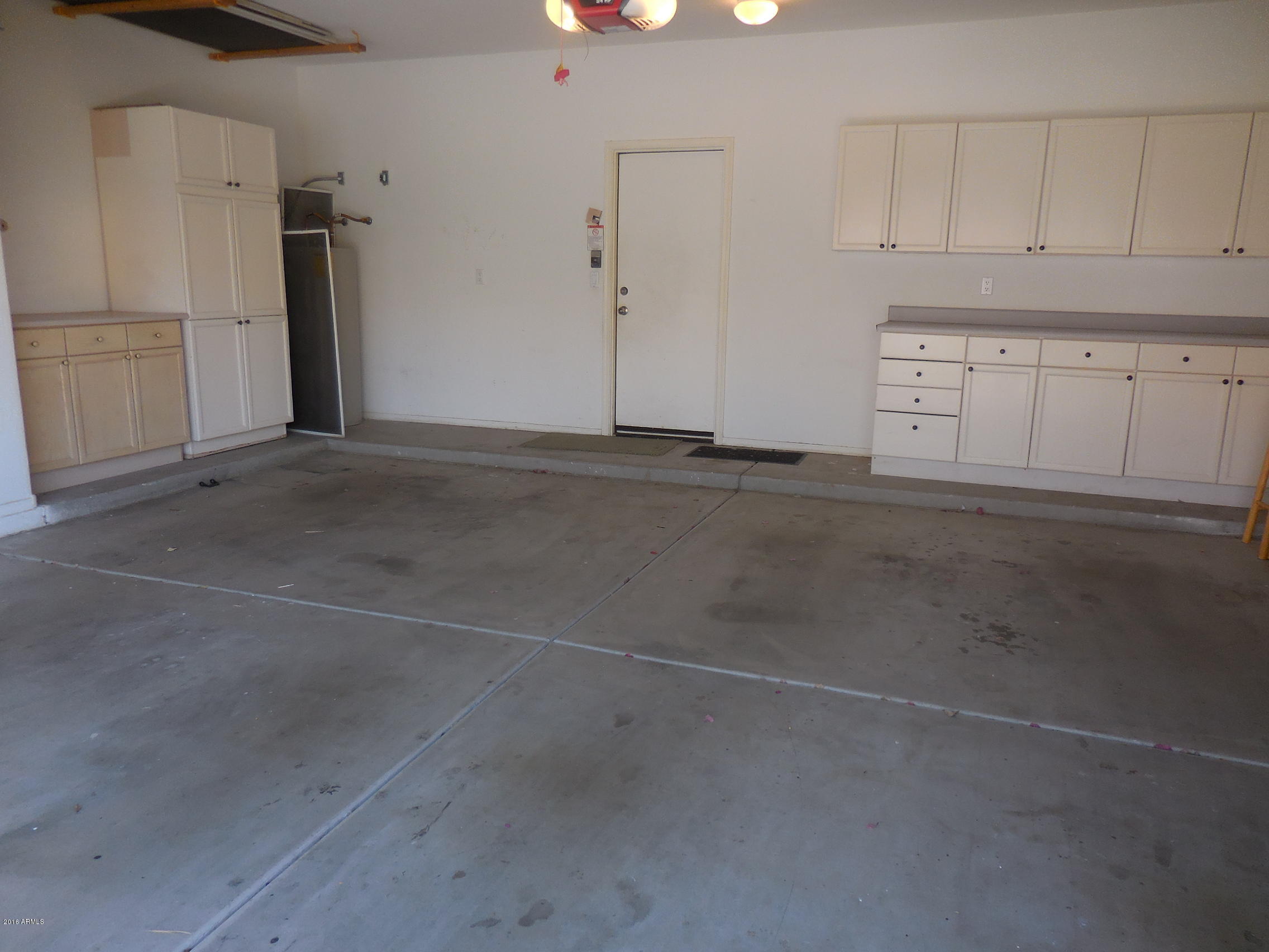 1237 East Redfield Road Phoenix, AZ 85022 - Photo 23 of 26 Garage w cabinets