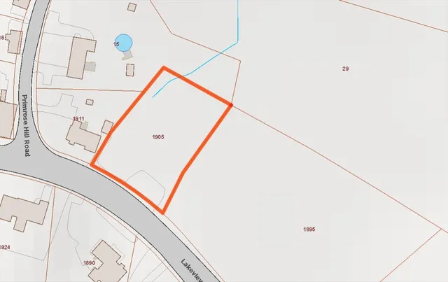 a view of a hallway with stairs